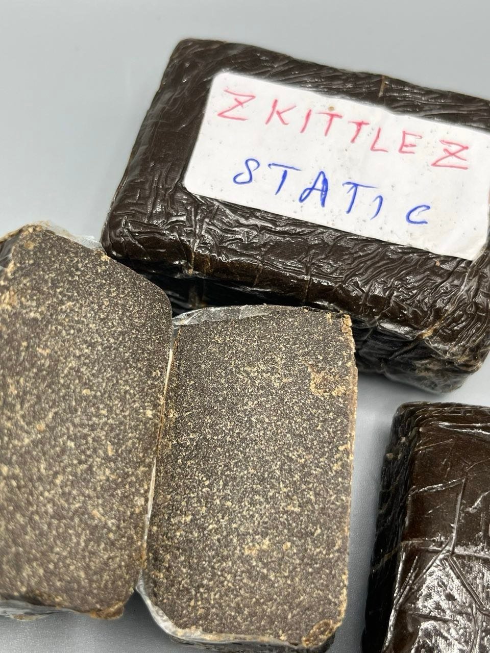 Buy Zkittlez Hash with rich fruity terpenes, clean solventless resin, and premium quality